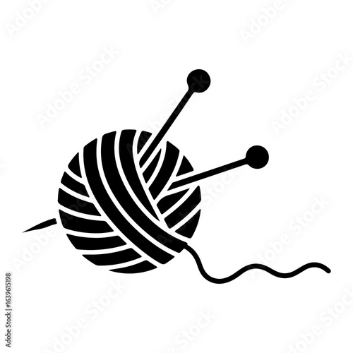 Black yarn ball with knitting needles craft hobby