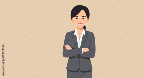 A businesswoman in a suit with her arms crossed