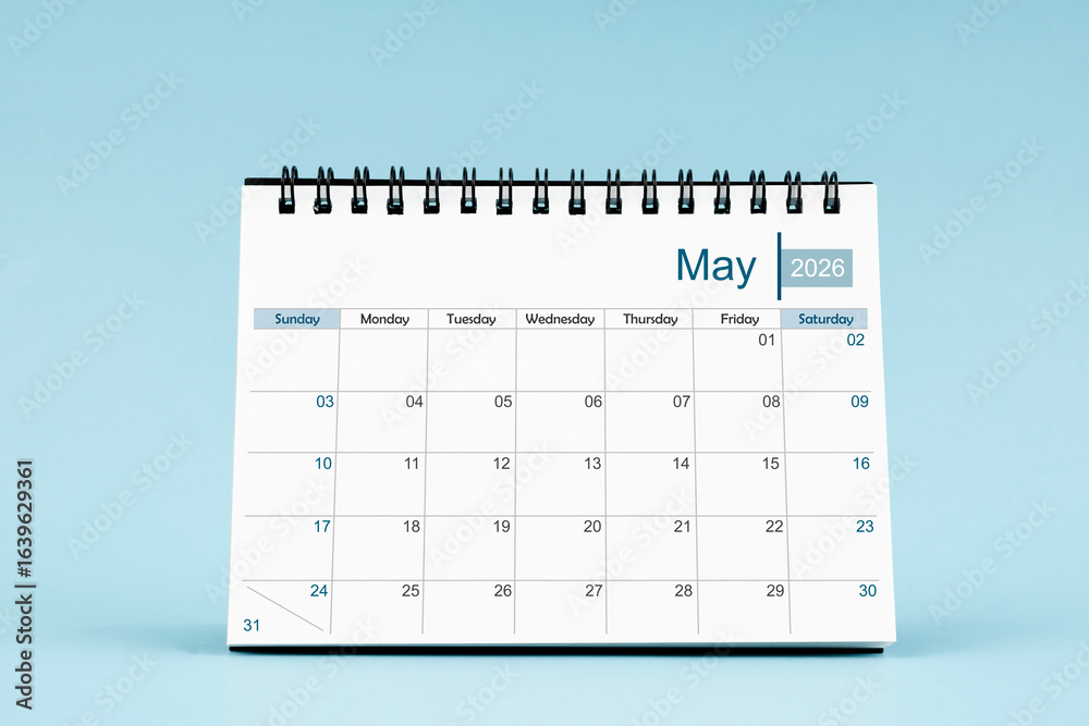 May 2026 Monthly desk calendar for 2026 year on soft blue color background. May 2026 Monthly desk calendar for 2026 year on soft blue color background.