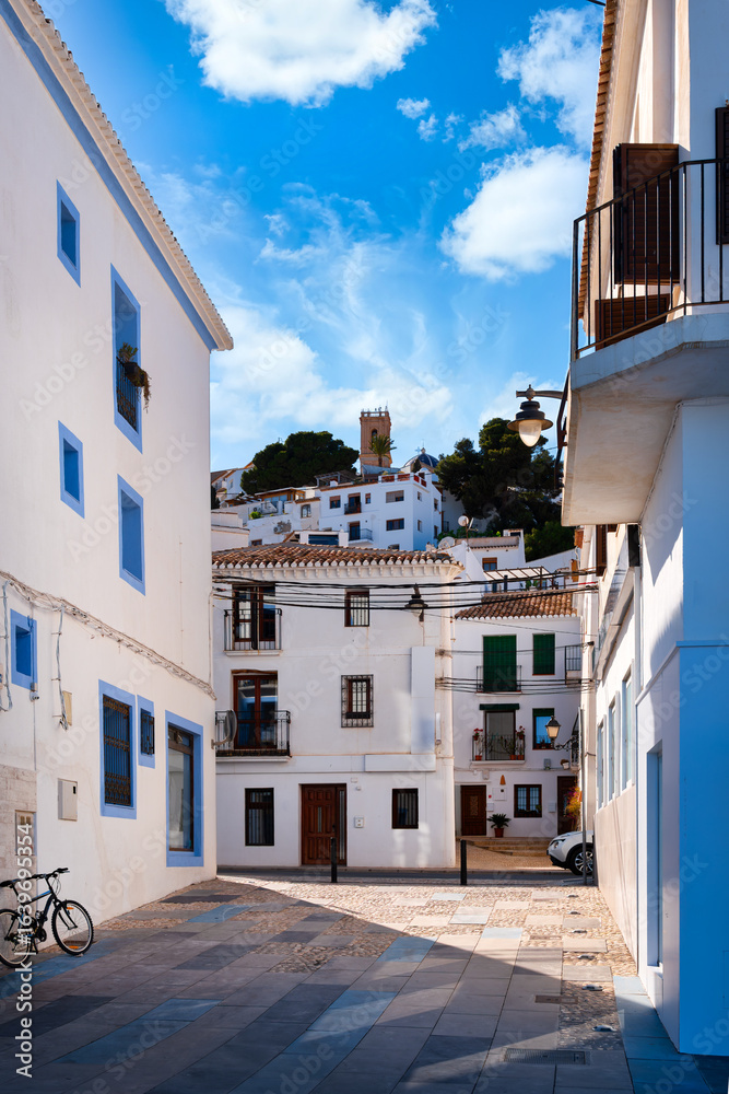 Fototapeta premium Altea, whitewashed alleys of the old town with view of the Church of Nuestra Señora del Consuelo