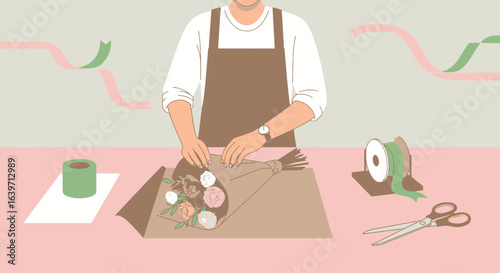 Florist preparing bouquet with wrapping paper and ribbon in pastel palette