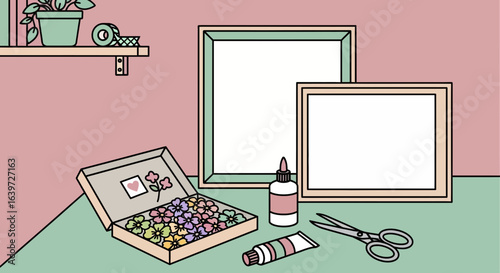 Creative crafting desk setting with frames and artistic supplies arrangement