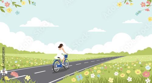 Girl enjoying a bicycle ride through a peaceful landscape in springtime