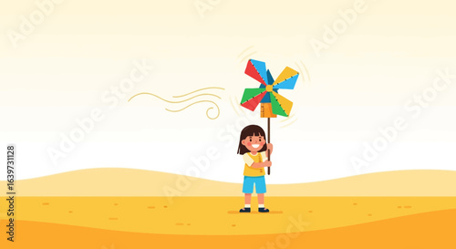 Smiling girl playing with colorful pinwheel on sunny day outdoors