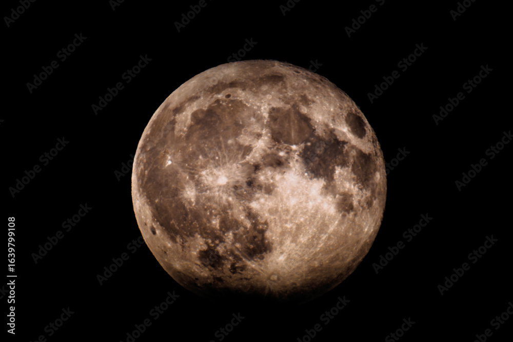 Fototapeta premium Full Moon close-up with detailed craters (Luna) against black sky