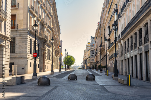Calle de Alcala starting at Puerta del Sol with impressive neoclassical buildings, Madrid, Spain.