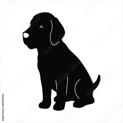 Adorable black labrador puppy sitting patiently in a profile silhouette