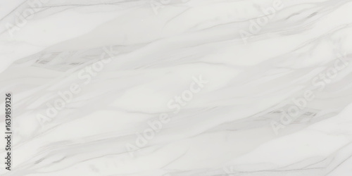 Luxury texture of light gray marble with flowing natural patterns and faint metallic highlights.	