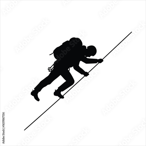 Adventurous hiker with backpack climbing a steep incline using a trekking pole silhouette