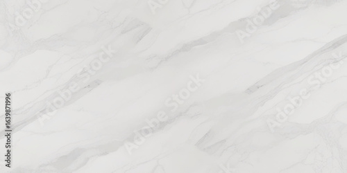 Luxury texture of light gray marble with flowing natural patterns and faint metallic highlights.