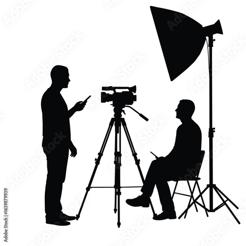Filmmaker interviewing a subject with a professional video camera and lighting setup