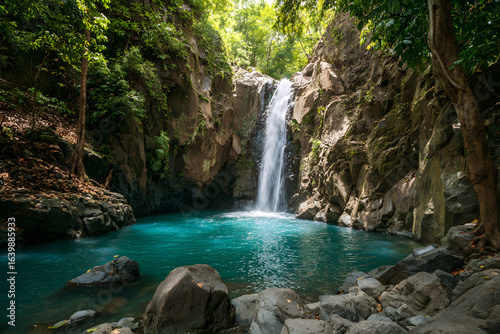 Majestic waterfall in the rainforest jungle of Costa Rica. La Cangreja waterfall in Rincon de La Vieja National Park, Guanacaste