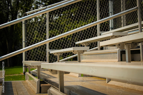 Konstfotografi aluminum raised step fan bleachers at a sporting event or field