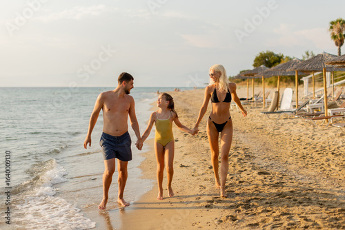 Family enjoys a joyful stro...