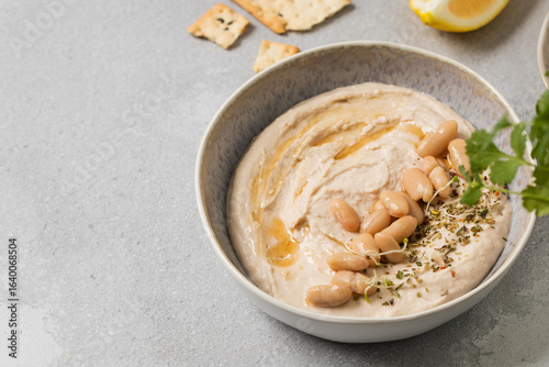 Healthy white bean hummus for snack. Healthy eating. Vegetarian snack. Copy space