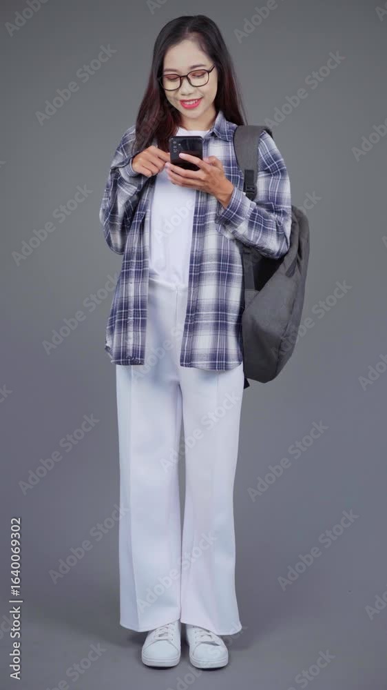 Asian Woman College Student Using Phone Asian Woman College Student Using Phone