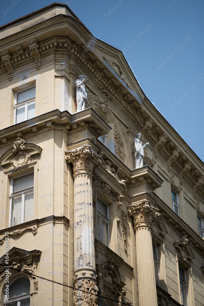Fototapeta premium The building exhibits characteristics of late 19th-century architecture, likely the Historicism or Ringstrasse style popular in Vienna at the time