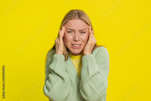Wall Mural Displeased exhausted Caucasian middle-aged woman rubbing temples to cure headache problem suffering from tension migraine stress