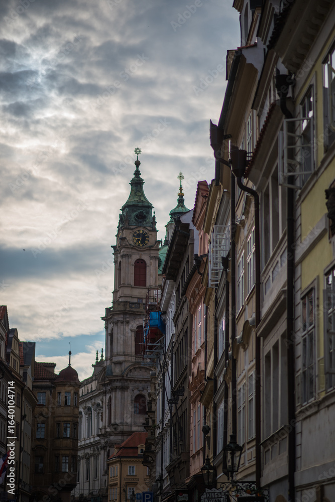 Obraz premium church of our lady before tyn, Baroque-style Church of St. Nicholas dominates the view. The church is prominent with its striking green dome and bell tower, which rises above the surrounding rooftops