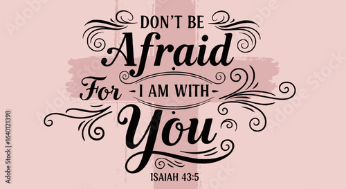 Inspirational Bible verse typography featuring 'Don't Be Afraid For I Am With You' from Isaiah 43:5 in elegant black lettering with decorative swirls and flourishes on soft pink watercolor background.
