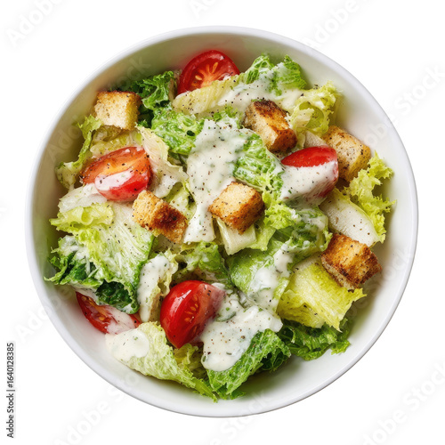 Fresh Caesar salad in white bowl