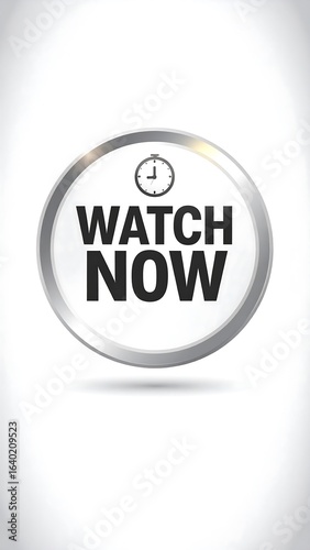 A metallic button with the words 