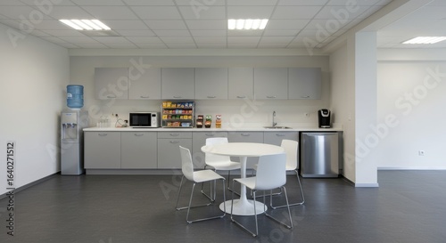 Modern office break room with minimalist design and ample counter space