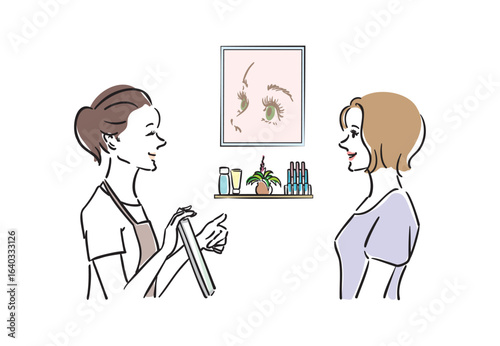 マツエクサロンでカウンセリングを受ける女性