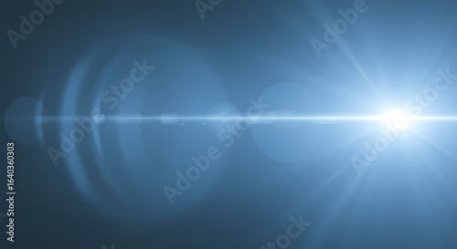 Blue Lens Flare: An Abstract Light Effect on a Dark Background