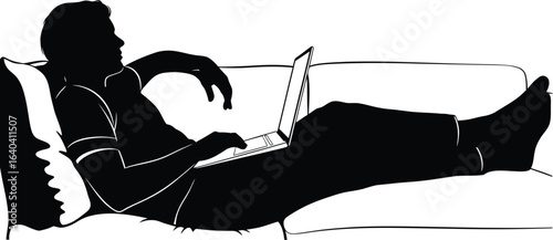 Relaxed man using laptop on couch, bright window plants visible in background