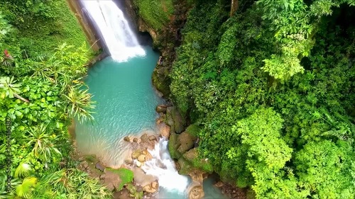 Turquoise Pool Beneath Tropical Waterfall - Lush Paradise