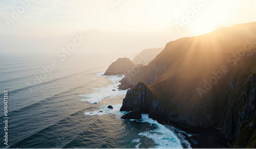 A view of the ocean from the top of a cliff.