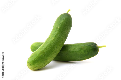 Fresh ripe whole green cucumbers isolated on white