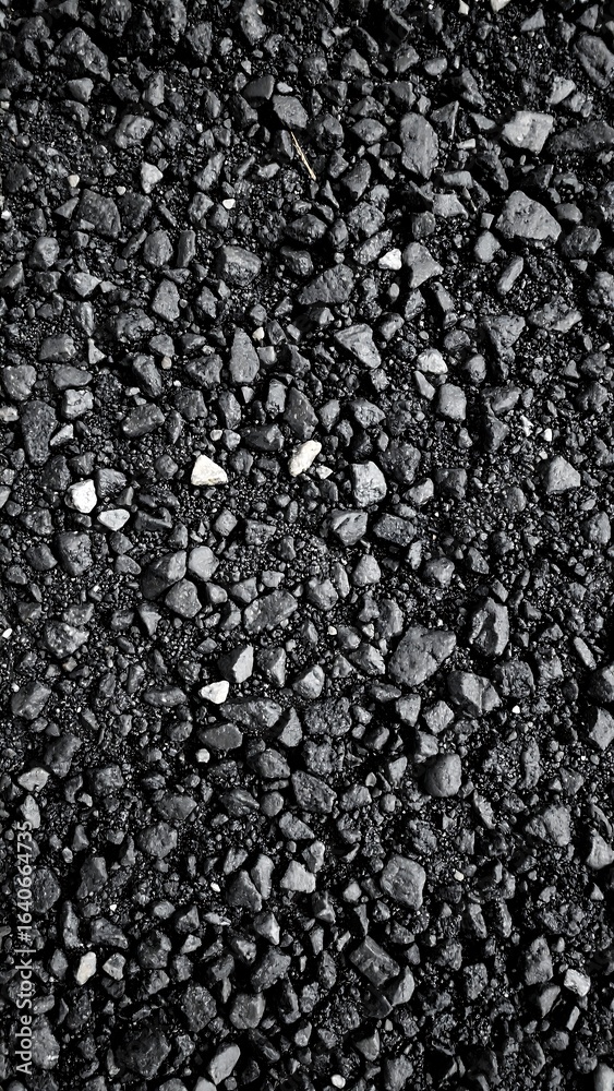 Close-up view of dark gravel Close-up view of dark gravel