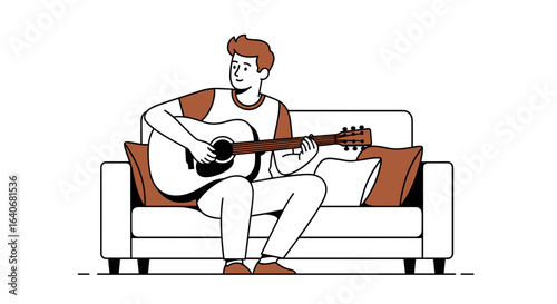 A man sitting on a couch playing an acoustic guitar in a relaxed position