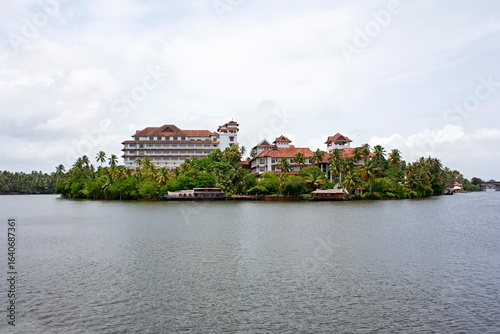 The serene backwaters of Ashtamudi Lake, located in Kollam, Kerala, India.