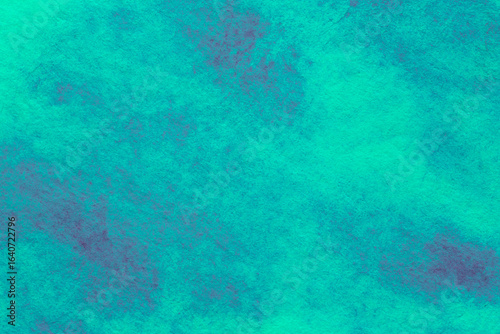 artistic backdrop: close up of canvas stained with watercolor paints