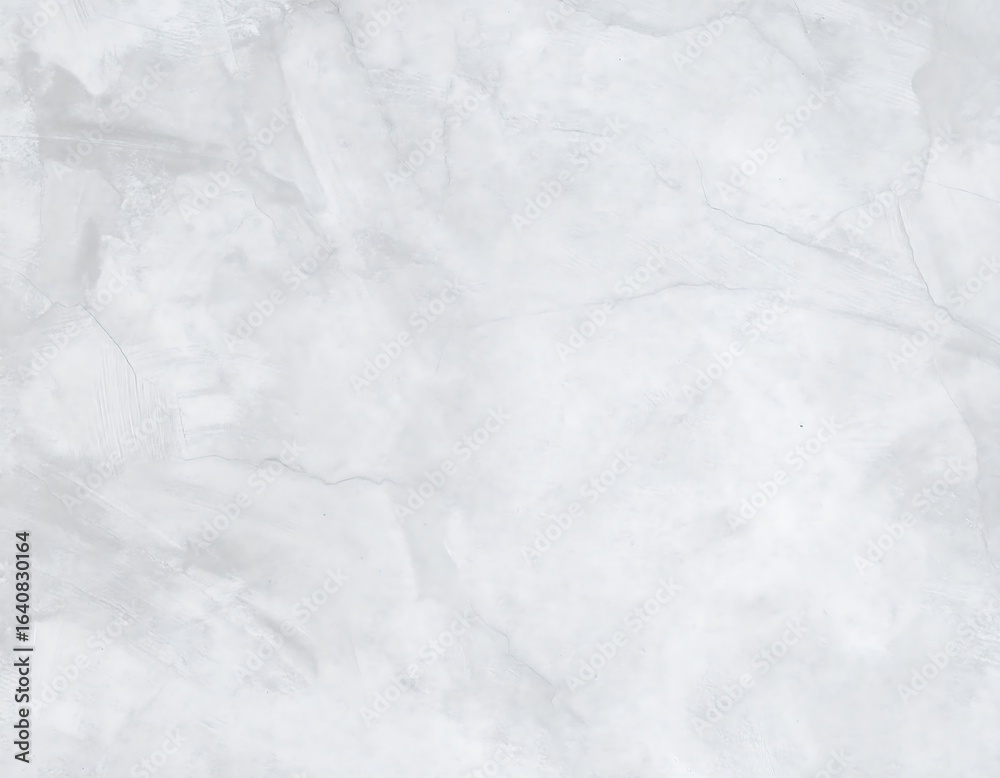 Fototapeta premium Close-up of a light gray, veined surface resembling polished stone or marble