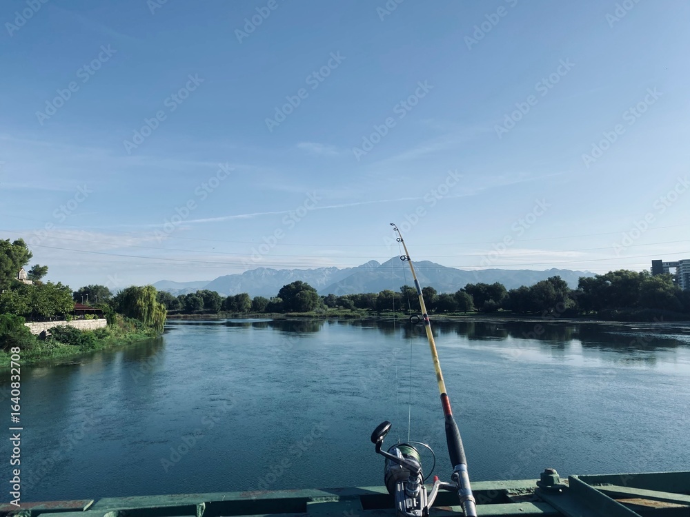 Fototapeta premium fishing rod on the river 