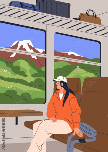 Travel by train. Woman passenger sitting by window, looking at mountain lands...