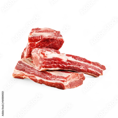 Raw beef short ribs on white background.