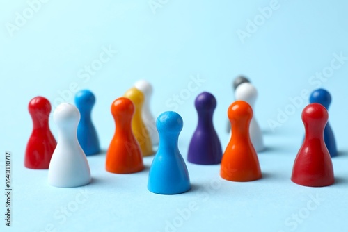 Foto Many figures are standing on a colored surface