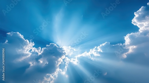 Radiant Sunlight Streaming Through Cumulus Clouds on a Bright Blue Sky, Aerial Perspective