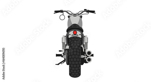 Rear View of a Classic Silver Motorcycle.