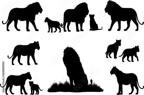 Silhouettes of lions and lion cubs outdoors
