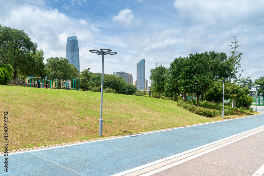 Obraz premium spring park and modern city