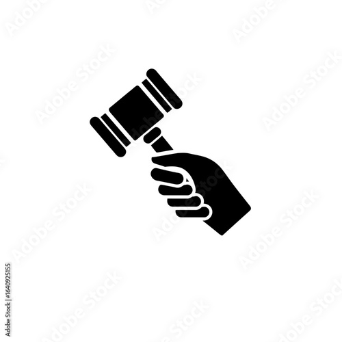 Hand holding gavel, symbolizing legal authority and judgment, concept for courtroom proceedings, dispute resolution and legislative sessions