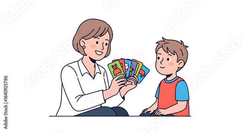 Adult woman teaching young boy with colorful educational flashcards for early learning and development