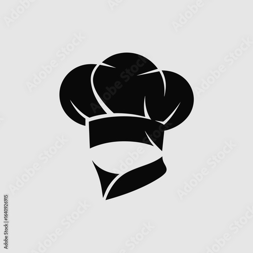 Bold black chef hat icon symbolizing culinary expertise and gourmet cooking, perfect for restaurant branding and food service businesses.