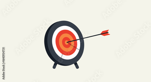 Arrow hits bullseye on colorful target over beige. Stands on small supports